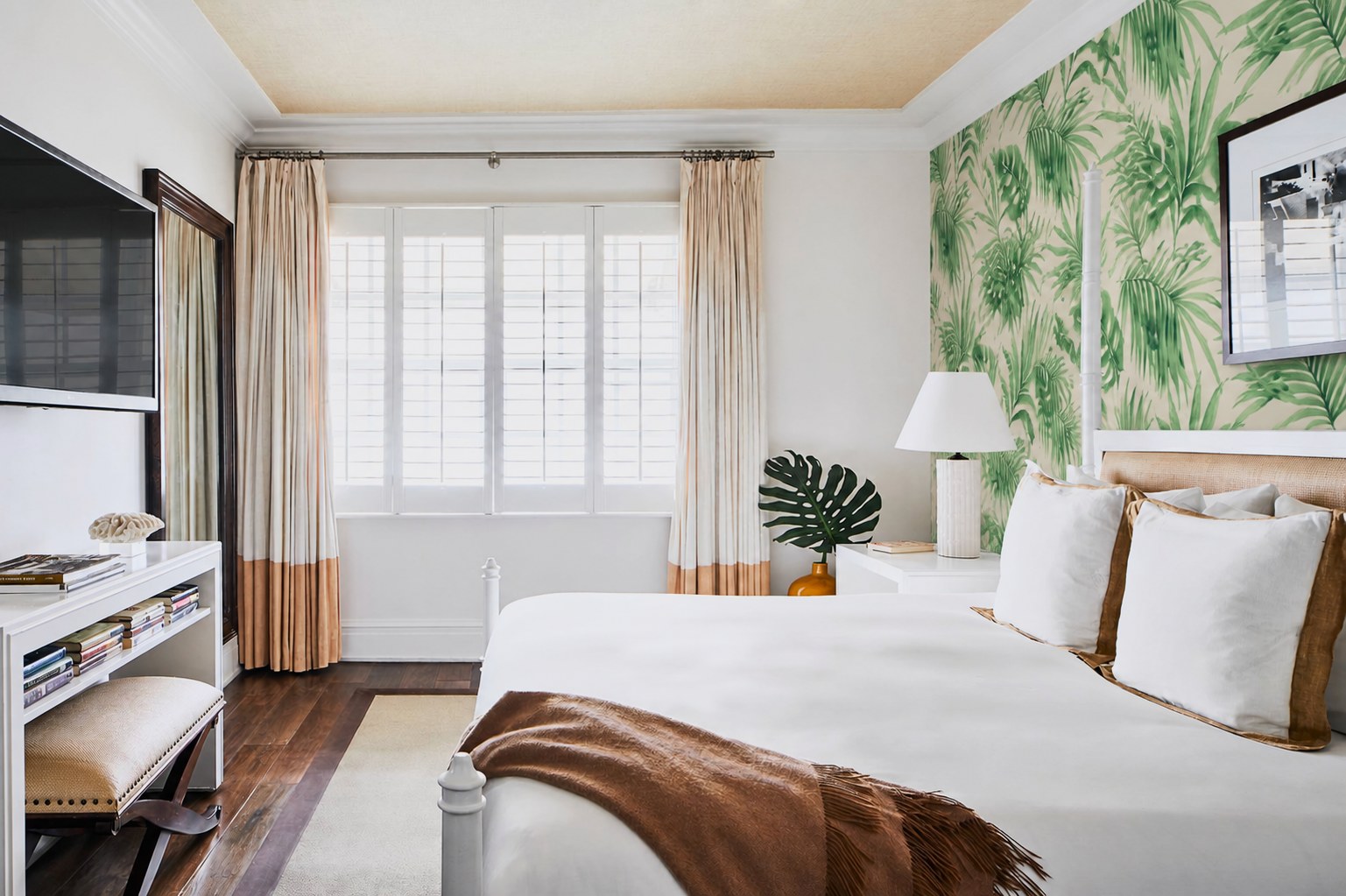 The Betsy Hotel — Classic King Suite with built-in media wall and open shelving