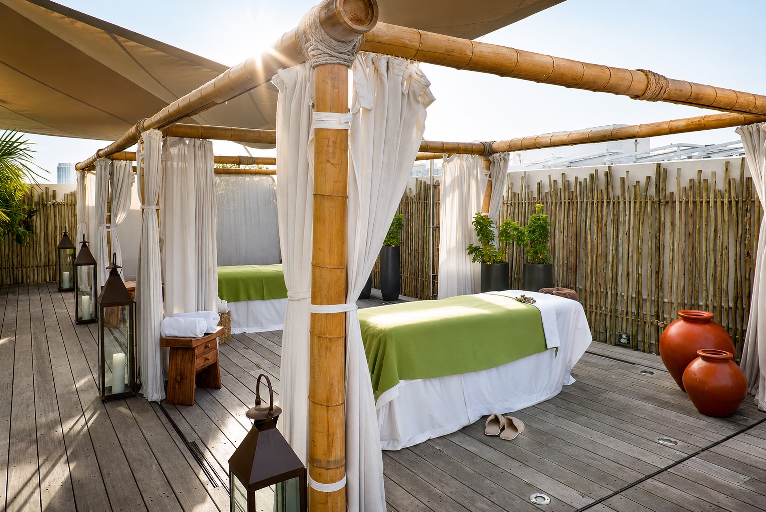 The Betsy Hotel — rooftop deck with bamboo spa cabanas by day