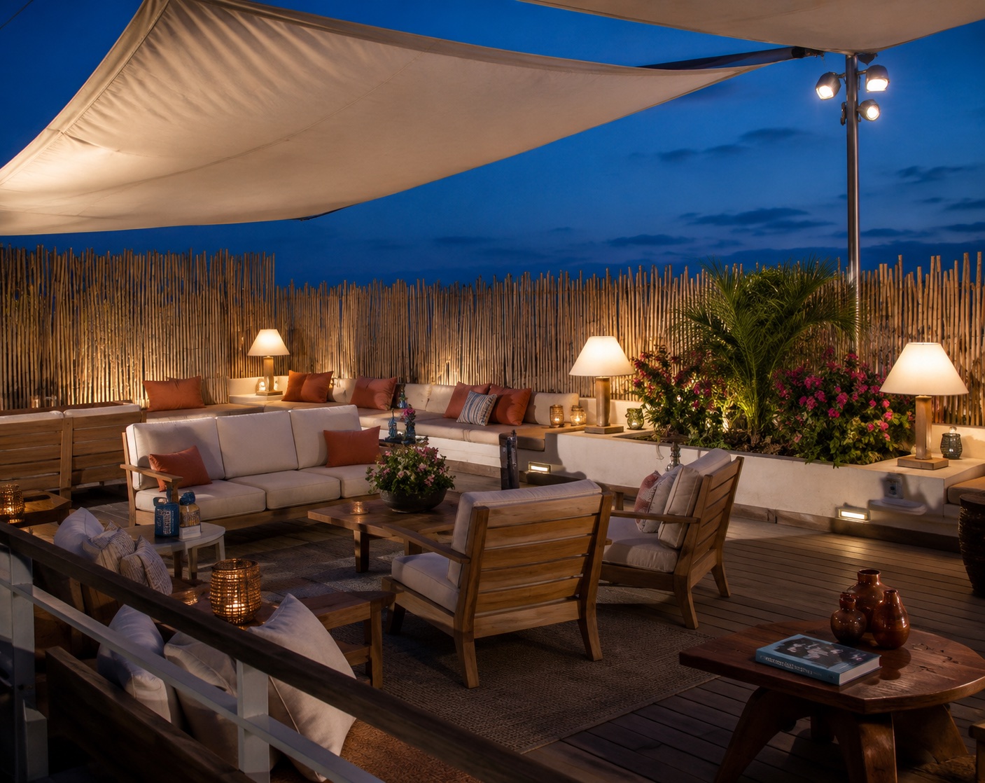The Betsy Hotel — rooftop lounge at dusk with sailcloth canopy and lanterns