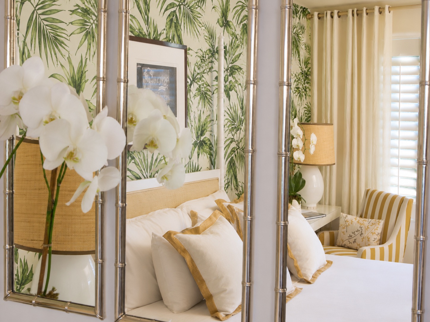 The Betsy Hotel — guest room detail with orchids reflected in a faceted mirror