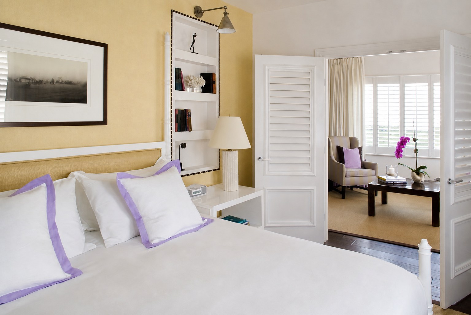 The Betsy Hotel — Royal Ocean View Suite bedroom in butter yellow with lilac accents