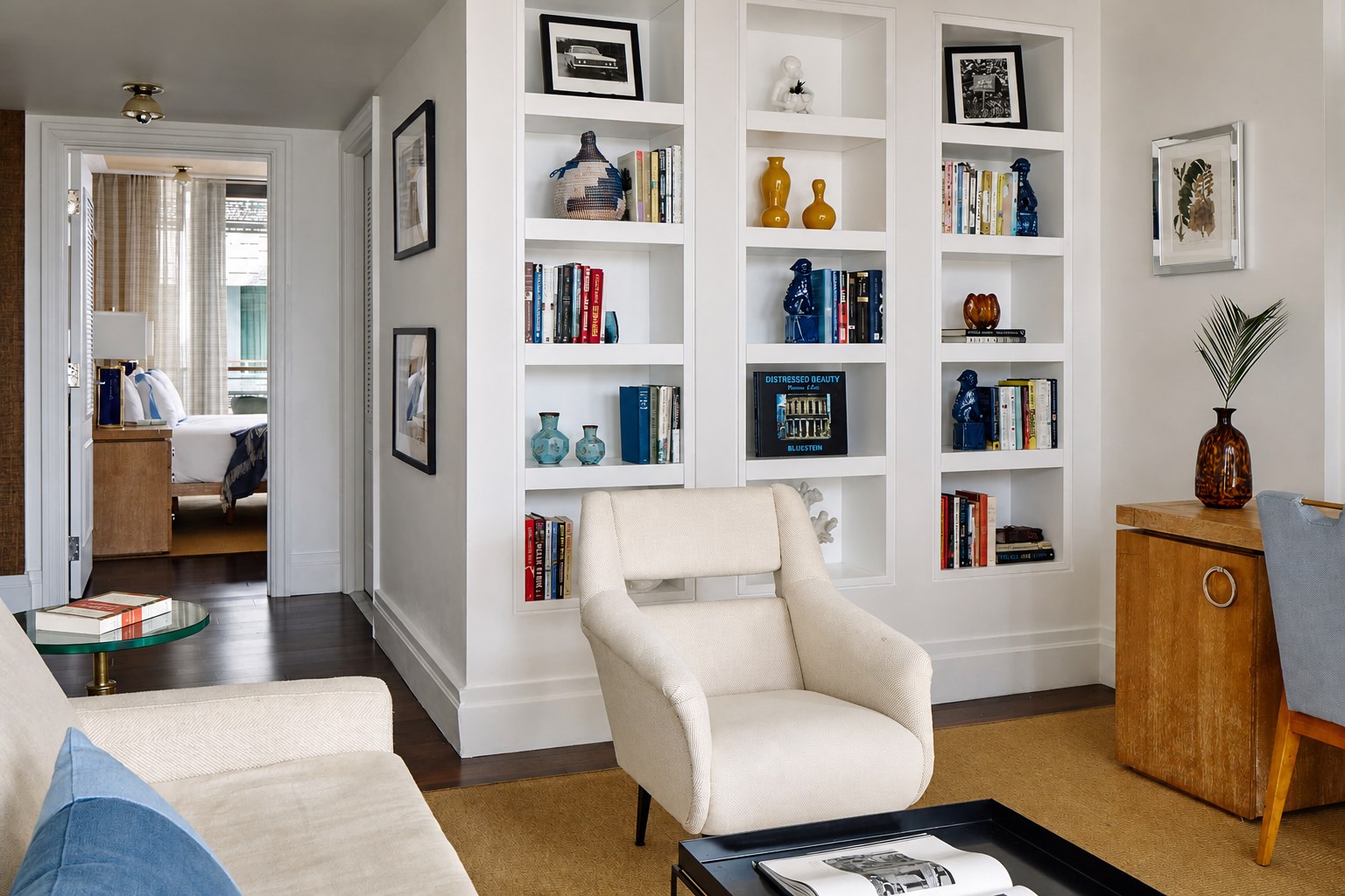 The Carlton Hotel — a balcony suite sitting room opening to the bedroom beyond
