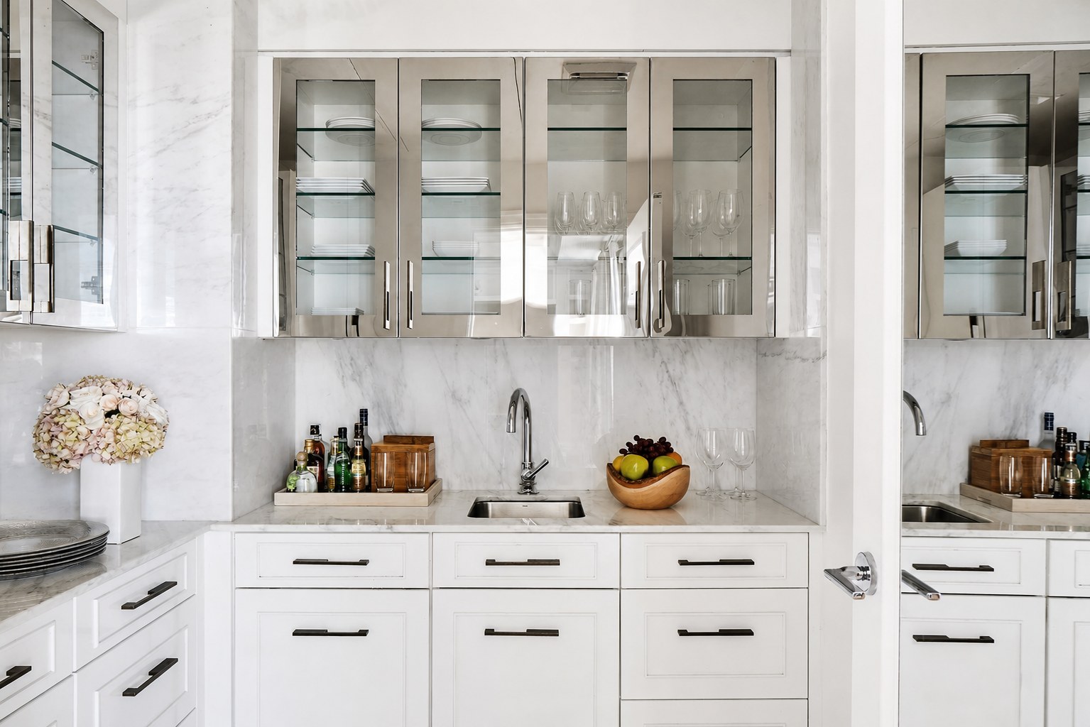 The Carlton Hotel — the penthouse butler's pantry in marble with polished-steel cabinetry