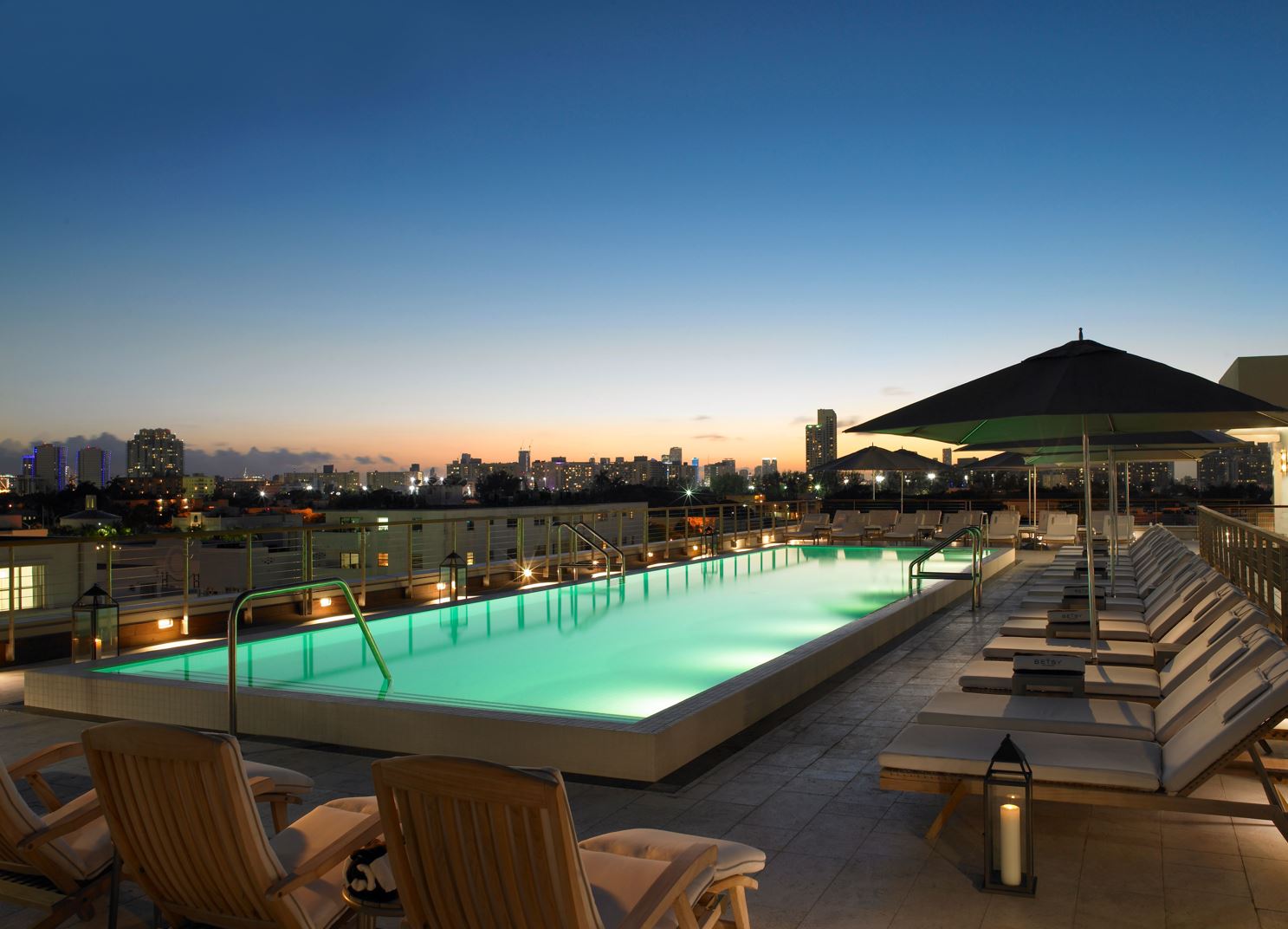The Carlton Hotel — the rooftop pool at dusk, overlooking the South Beach skyline