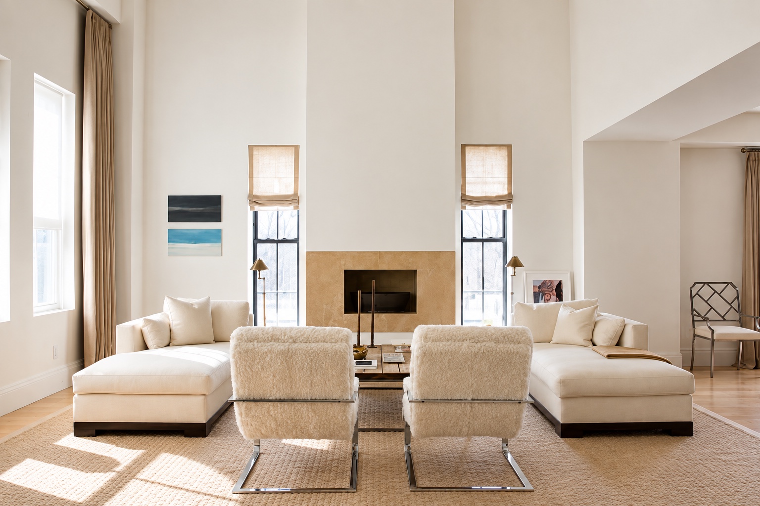 Tribeca Loft duplex in New York — a light-filled living room with sculptural seating and pale linen tones