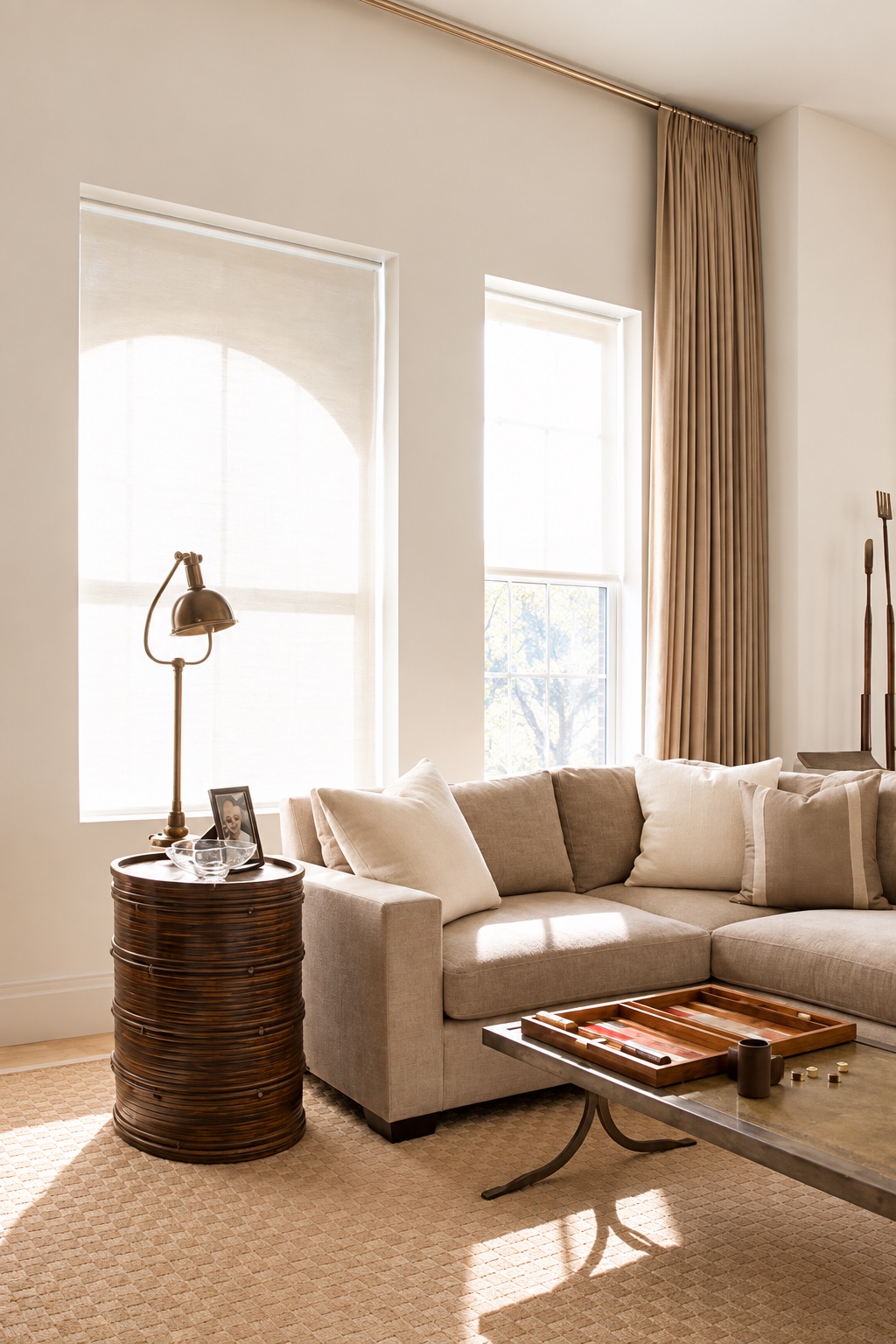 Tribeca Loft — sitting area with linen sofa and drum side table
